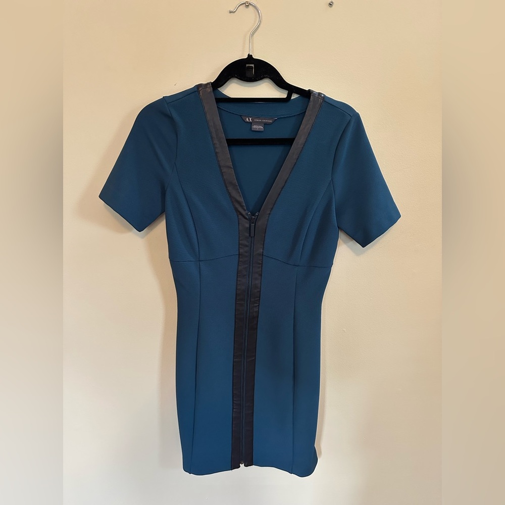 Beautiful dress, only worn a few times, full zip closure from top to bottom